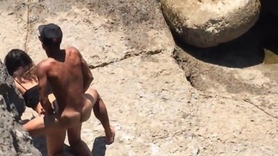 Couple have outdoor sex near water